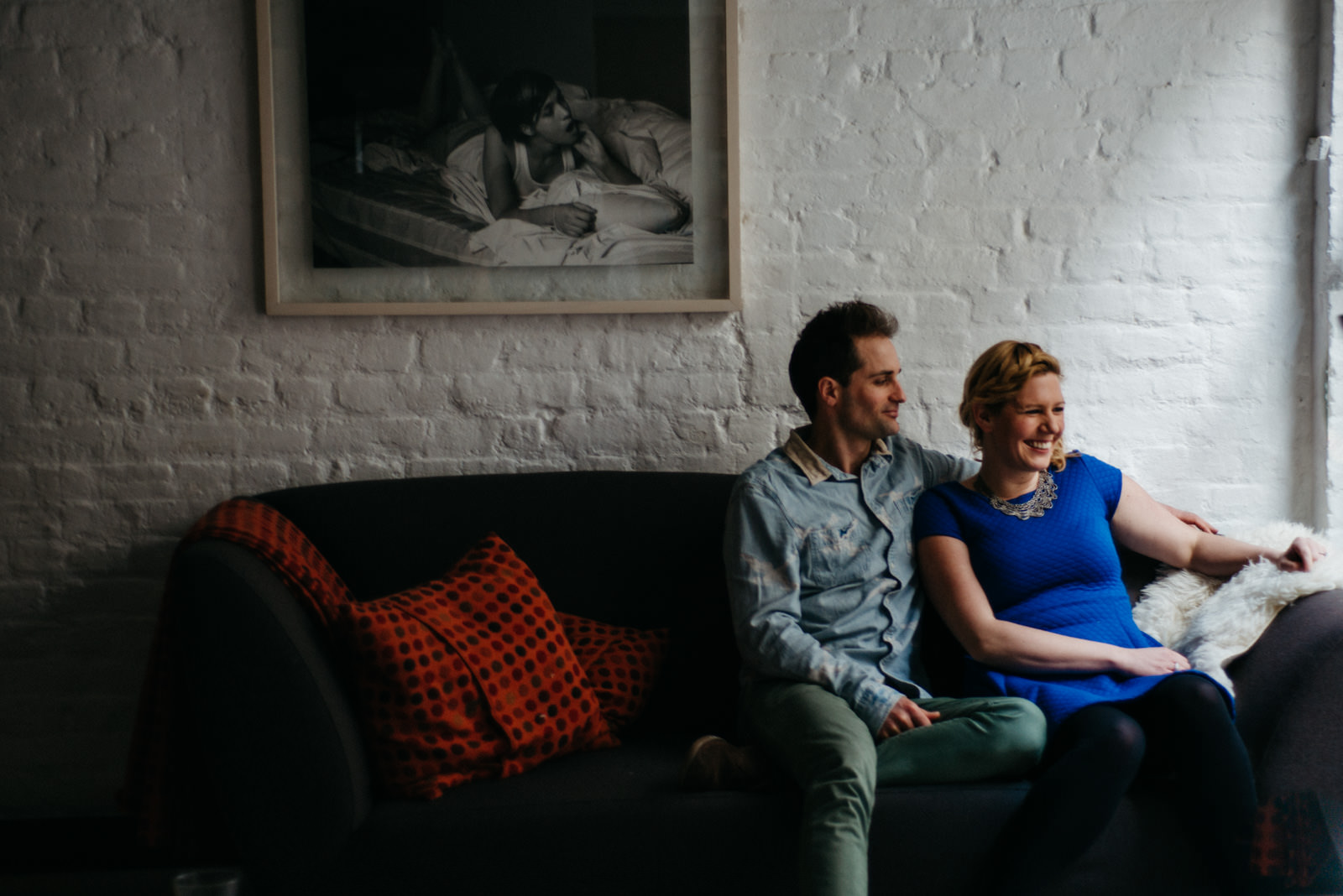 Couple relaxing at home during their Shoreditch couple shoot in East London