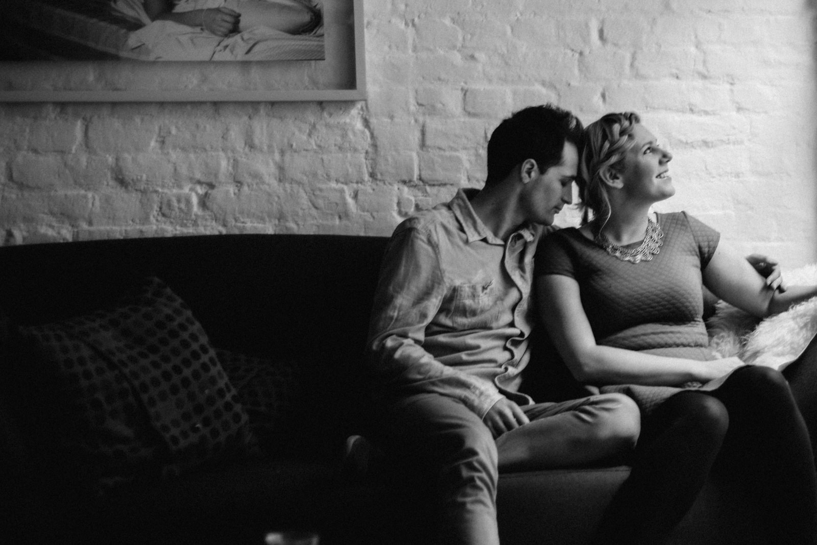 Couple relaxing at home during their Shoreditch couple shoot in East London