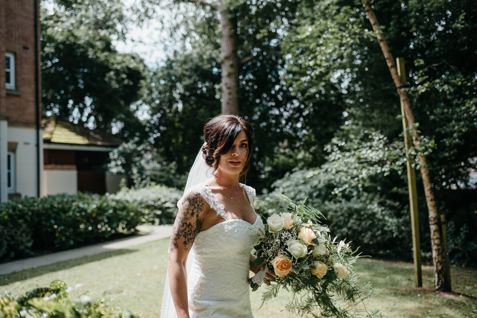 beautiful modern tattooed bride ahead of her alternative wedding in cardiff