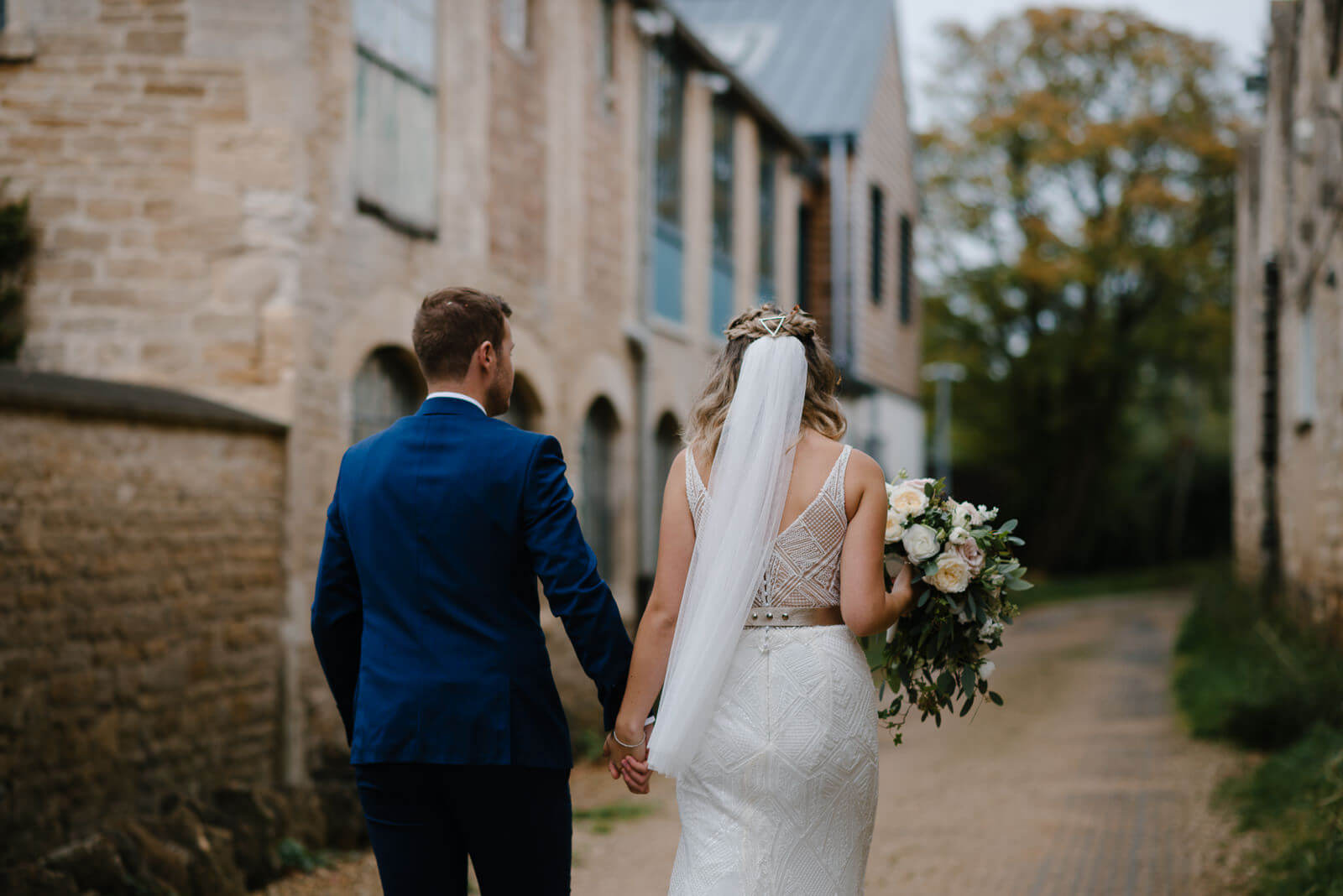 bride and groom exploring near Wiltshire wedding venue Glove Factory Studios