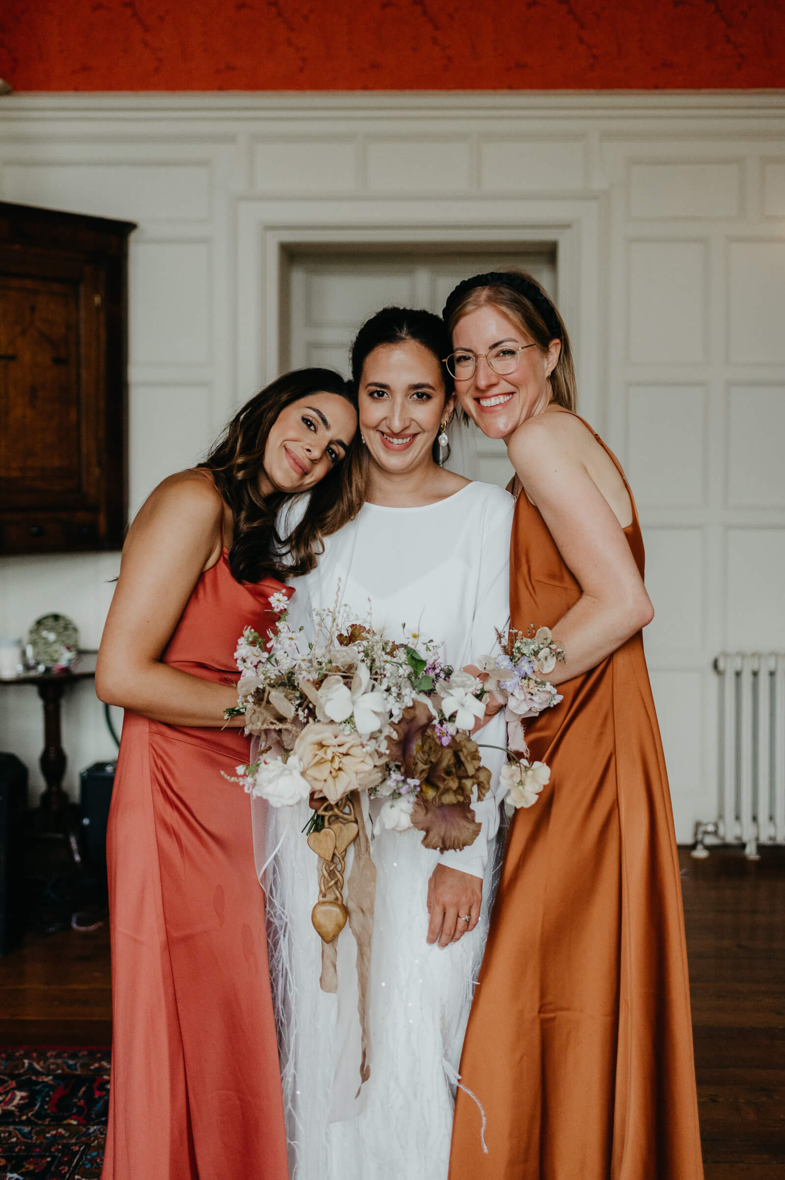 bride and her bridesmaids inside Plas Dinam Country House