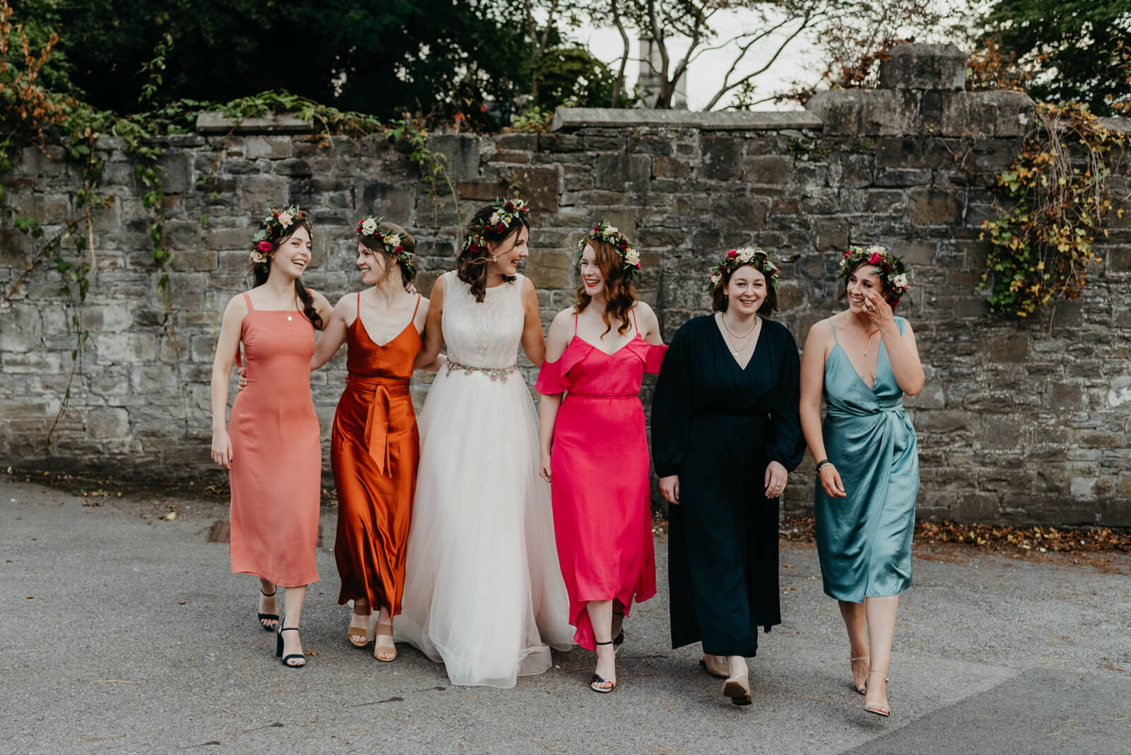 Informal photo of mismatched bridesmaids and bride at Insole Court Wedding